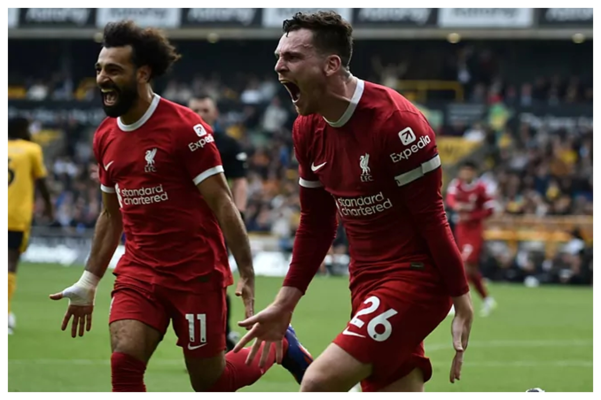 Mohamed Salah y Andrew Robertson celebran el 1-2 del Liverpool