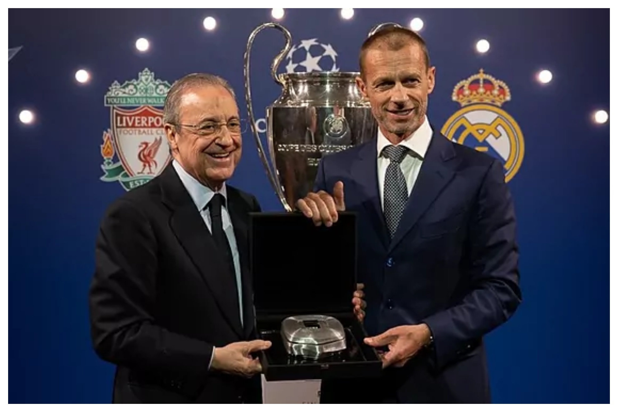 Florentino y Ceferin, presidente de la UEFA, posan con la rplica del Bernabu